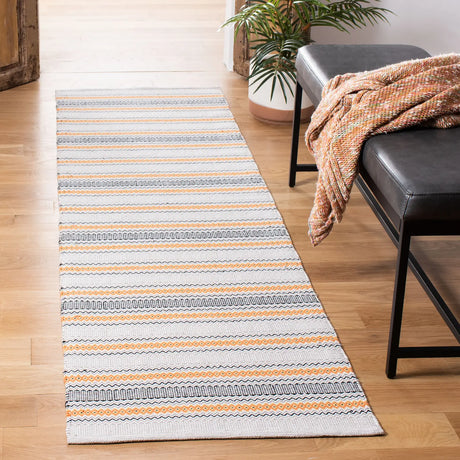 Safavieh Montauk 2'-3" x 8'-0" Rug in Orange / Beige