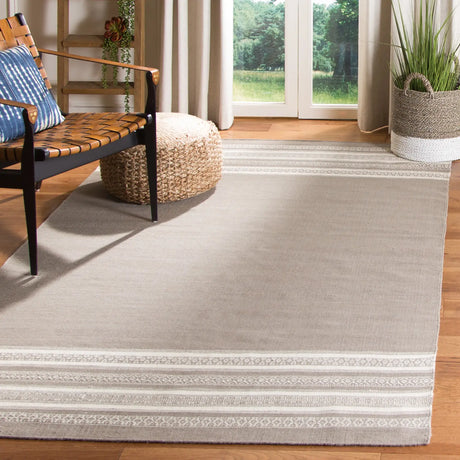 Safavieh Dhurries 5'-0" x 8'-0" Rug in Light Brown