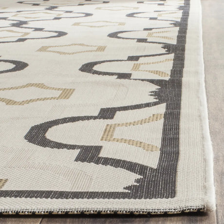 Safavieh Courtyard 6'-7" x 9'-6" Rug in Beige / Black