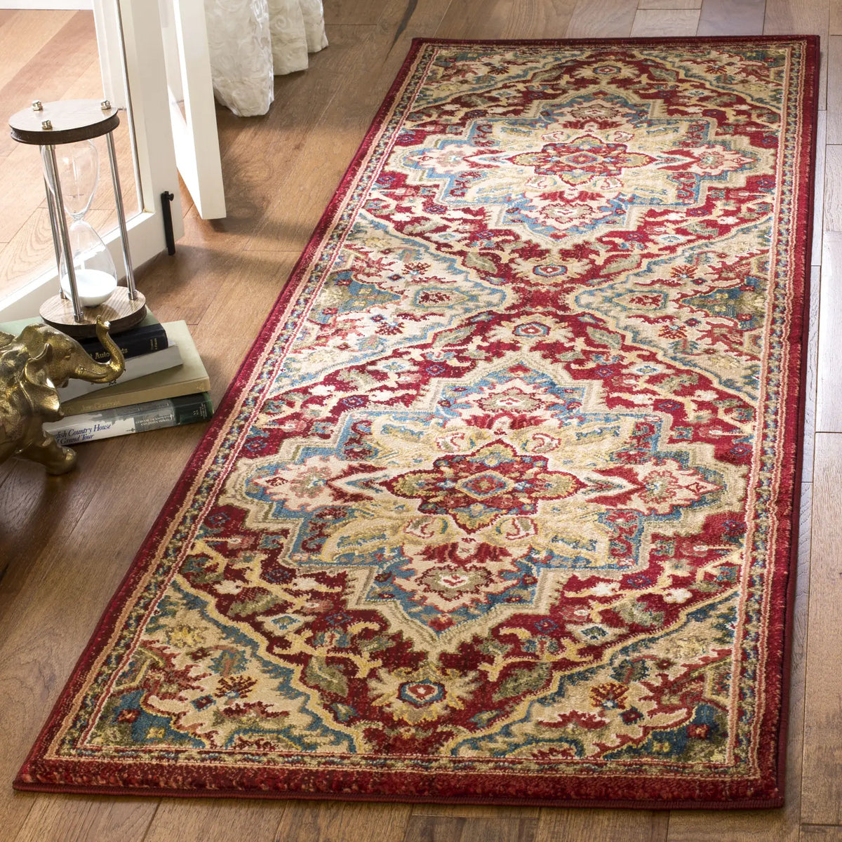 Safavieh Kashan 2'-6" x 10'-0" Rug in Red / Beige