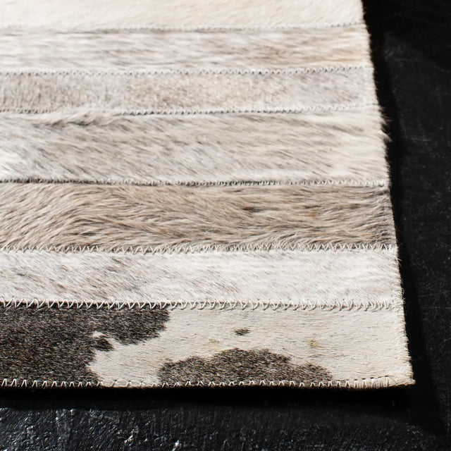 Safavieh Studio Leather 4'-0" x 6'-0" Rug in Grey / Ivory