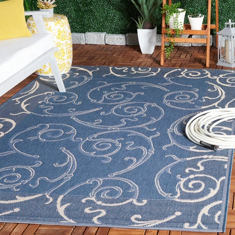 Safavieh Courtyard 5'-3" x 7'-7" Rug in Blue / Natural