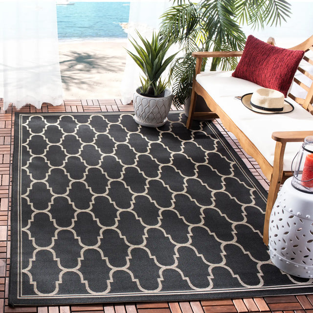 Safavieh Courtyard 5'-3" x 7'-7" Rug in Black / Beige