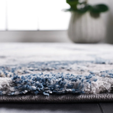 Safavieh Cyrus Shag 4'-5" x 6'-5" Rug in Ivory / Blue