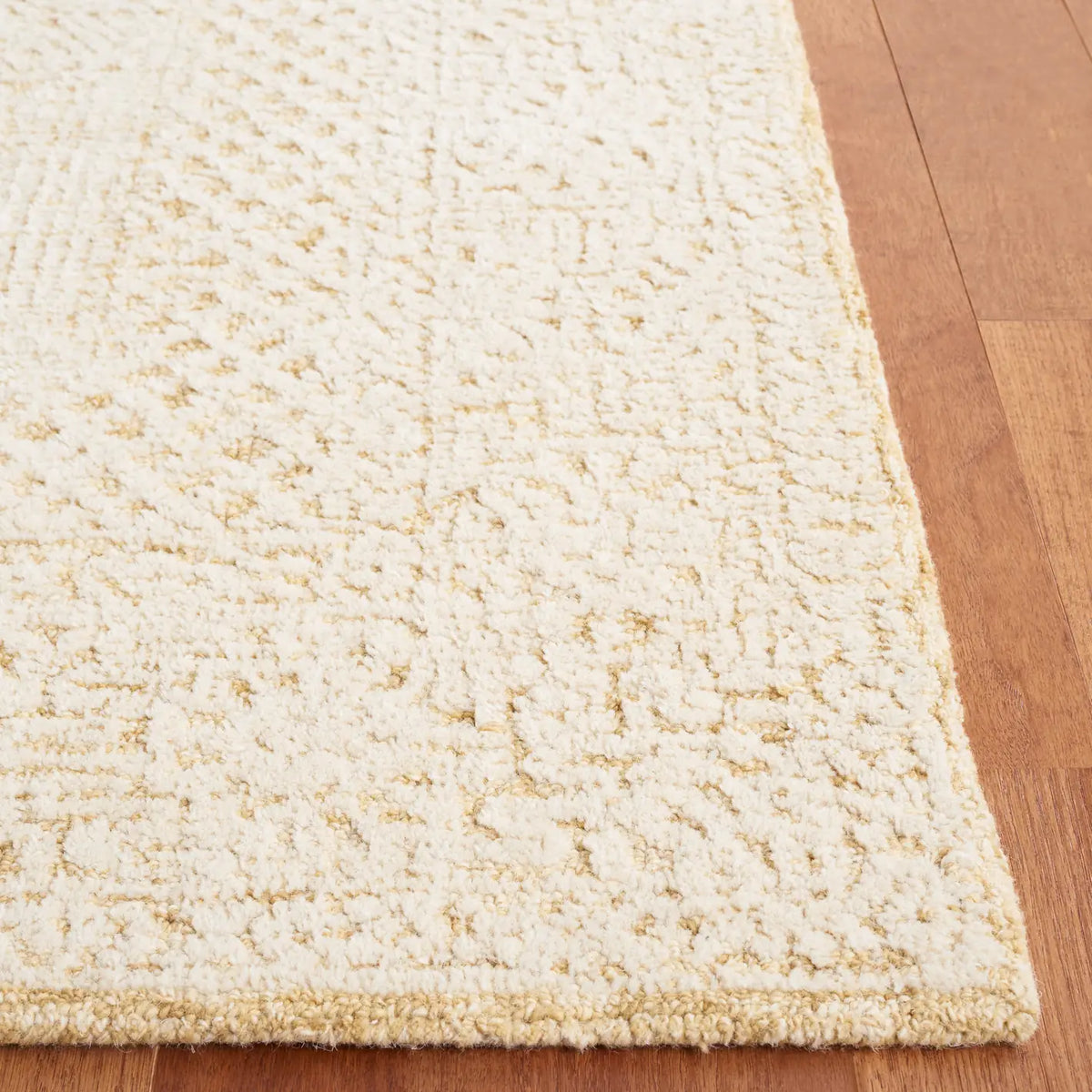 Safavieh Textural 4'-0" x 6'-0" Rug in Gold / Ivory