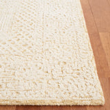 Safavieh Textural 4'-0" x 6'-0" Rug in Gold / Ivory