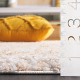 Safavieh Rumi Shag 4'-0" x 6'-0" Rug in Gold / Ivory