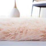 Safavieh Faux Sheep Skin 4'-0" x 6'-0" Rug in Light Pink
