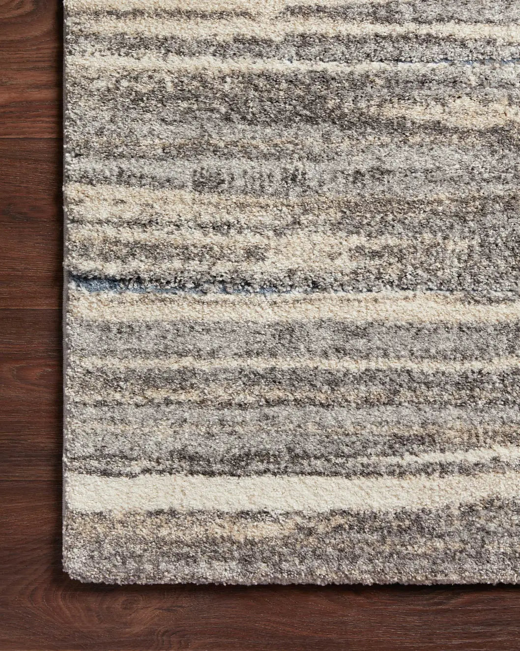 Loloi Theory Thy-01 Mist/Beige Rugs - corner on wood