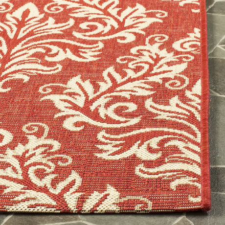 Safavieh Courtyard 5'-3" x 7'-7" Rug in Red / Creme