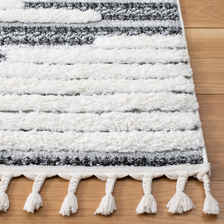 Safavieh Moroccan Tassel Shag 4'-0" x 6'-0" Rug in Dark Grey / Ivory
