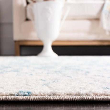 Safavieh Madison 4'-0" x 6'-0" Rug in Teal / Ivory