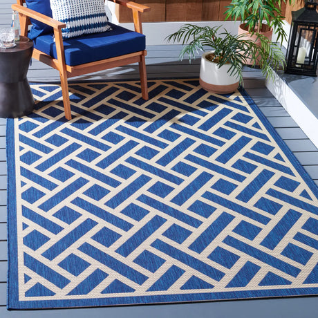 Safavieh Courtyard 5'-3" x 7'-7" Rug in Navy / Light Beige