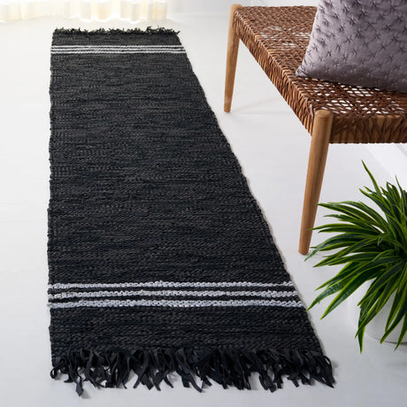 Safavieh Vintage Leather 2'-3" x 9'-0" Rug in Black / Ivory