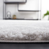 Safavieh Berber Shag 4'-5" x 6'-5" Rug in Ivory / Grey