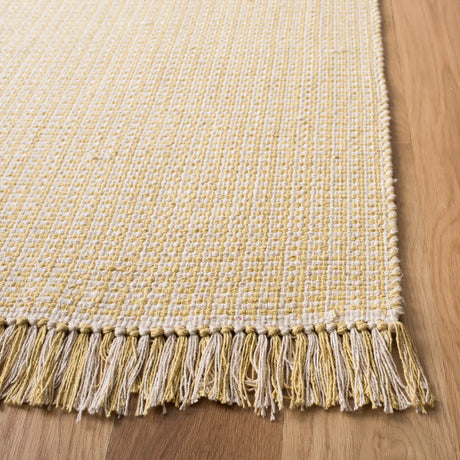 Safavieh Montauk 5'-0" x 8'-0" Rug in Ivory / Yellow