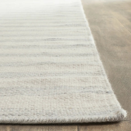 Safavieh Dhurries 6'-0" x 9'-0" Rug in Light Blue / Ivory