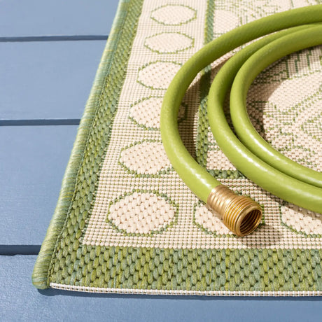 Safavieh Courtyard 5'-3" x 7'-7" Rug in Natural / Olive