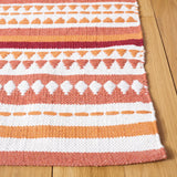 Safavieh Montauk 4'-0" x 6'-0" Rug in Orange / Ivory