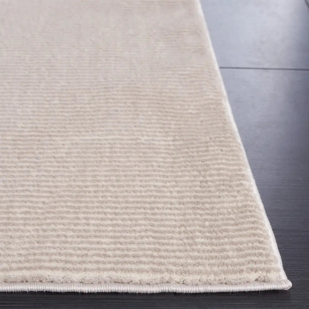 Safavieh Revive 5'-3" x 7'-7" Rug in Beige