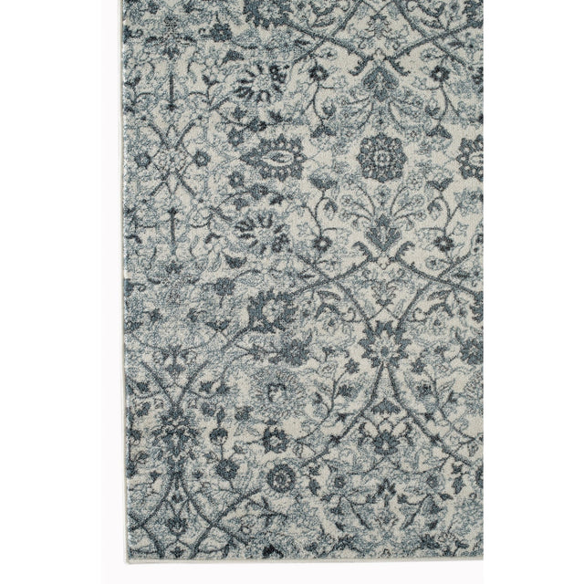 Light blue floral power-loom area rug with ornate medallion and scroll pattern