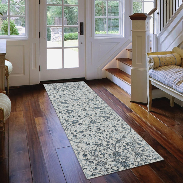 Light blue floral area rug runner style with ornate damask pattern in living space