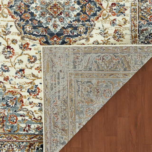 Ivory and navy medallion rectangle area rug with multicolor floral motifs