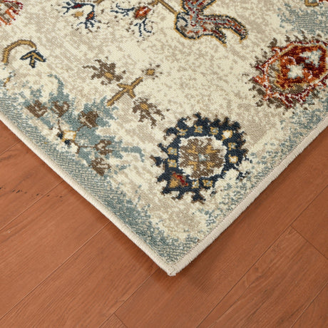 Beige oriental area rug with navy, rust, and light blue floral medallions