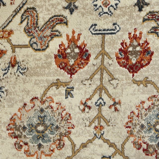 Beige oriental area rug tight pattern view with red and blue floral rosettes