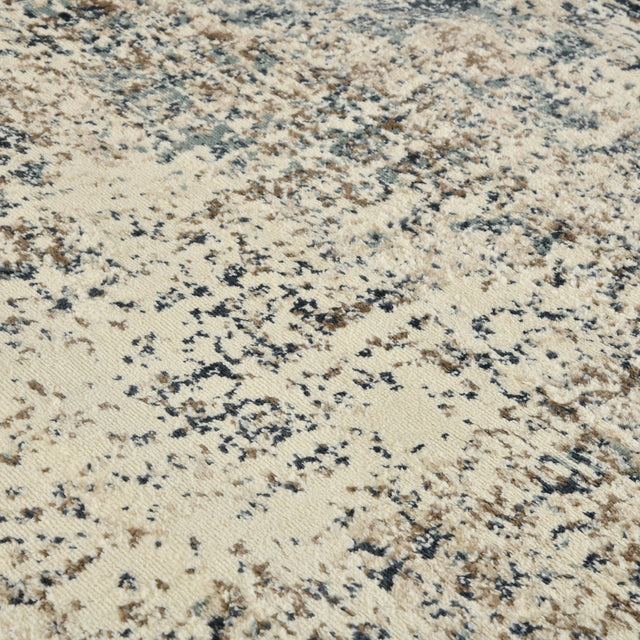 Contemporary low-pile area rug with light cream, blue, and dark fleck pattern