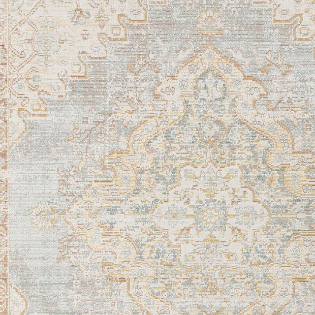 Detailed rug field with distressed medallion motifs in light ivory, gray, and gold