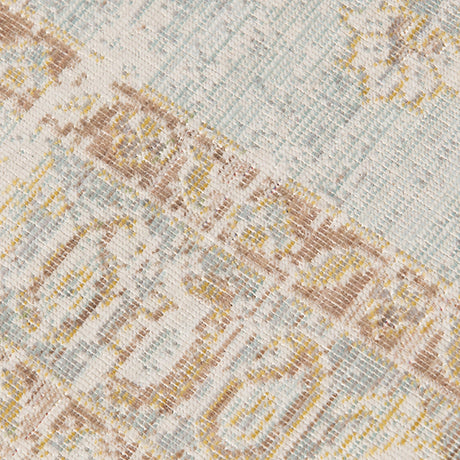 Close-up woven rug surface with diamond and stripe texture in ivory, gray, and tan