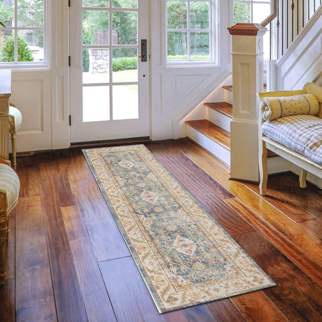 Indigo blue and ivory vintage-style runner rug with distressed medallion pattern