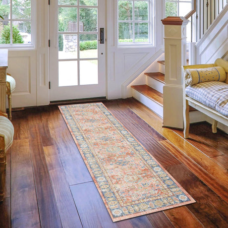 Runner area rug with multicolor distressed medallion pattern in bright room