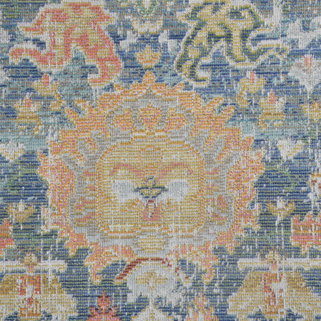 Amer Century vintage medallion rug close-up, blue and orange distressed medallion pattern