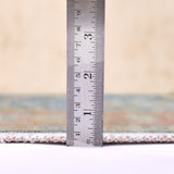 Amer Century vintage medallion rug with flat woven edge and fringe, measured by ruler