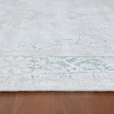 Sea mist medallion area rug flatweave texture with faded blue floral center motif