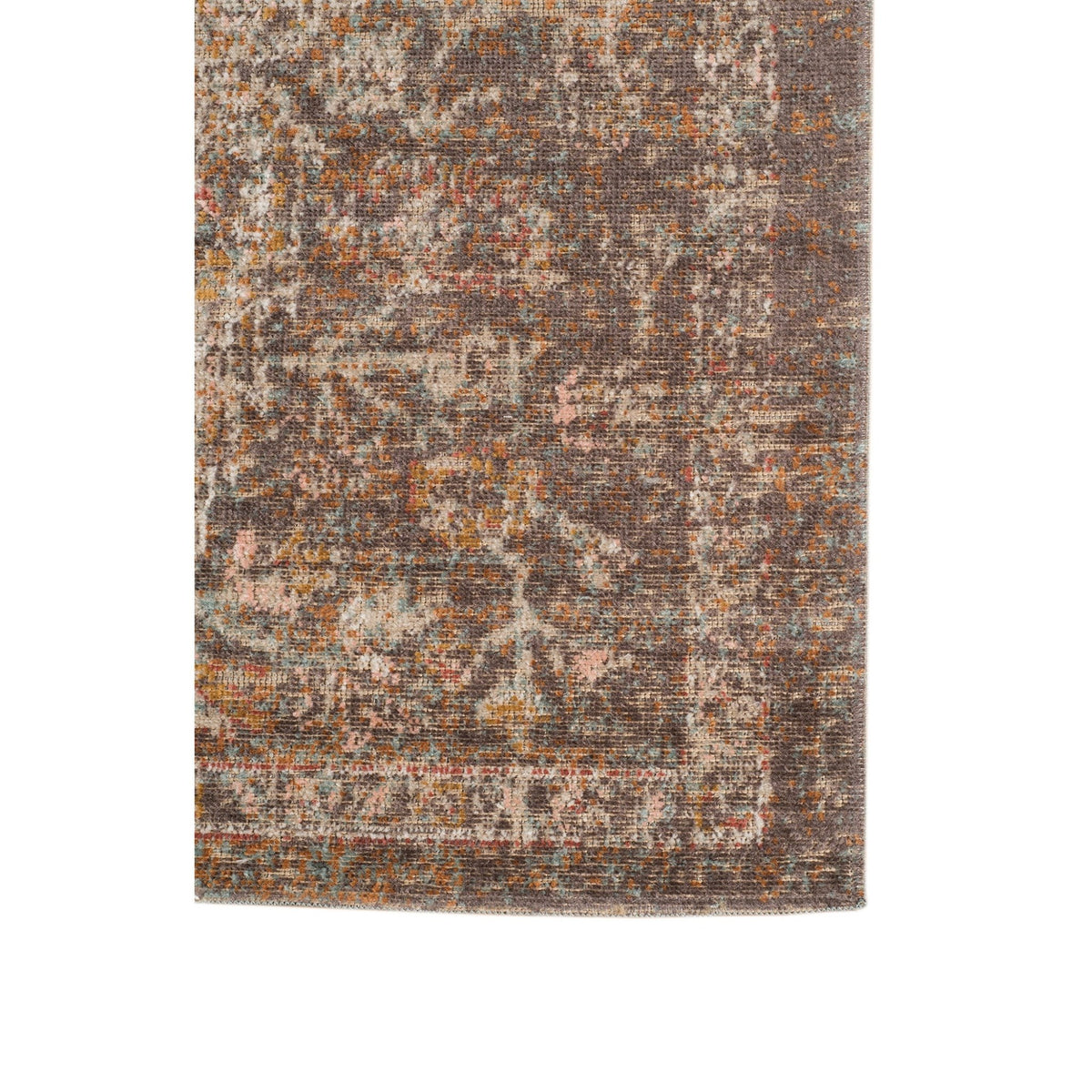 Taupe medallion area rug with scattered distressed motif pattern on rectangular surface