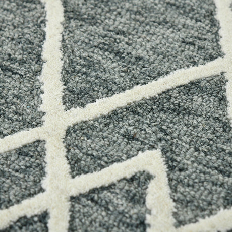 Dense close-up of gray geometric pattern with off-white intersecting lines