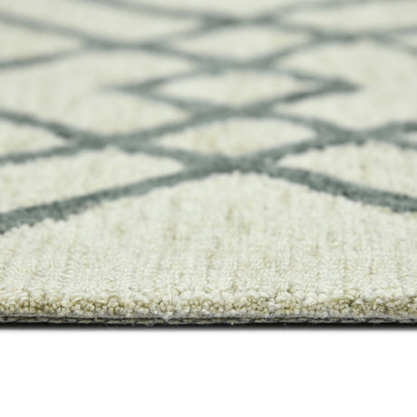 Ivory geometric area rug closeup of low pile edge and dark gray lattice lines