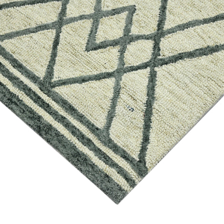 Ivory geometric area rug with dark gray grid and outlined diamond shapes