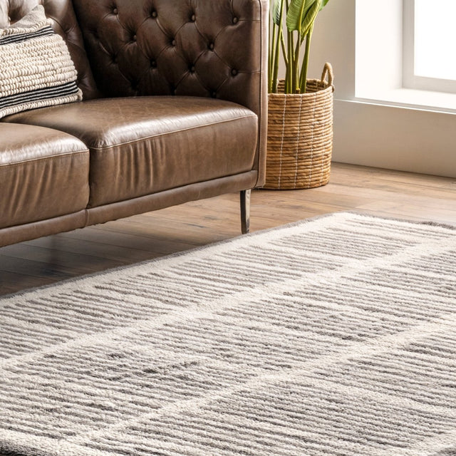 AreaRugs.com Machine Washable Wavaj Nwa1292A Ivory Rug.