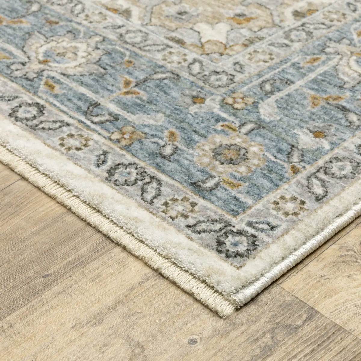 Oriental Weavers Sphinx Maharaja 051F1 Blue/ Ivory Rug - corner detail