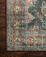 Loloi Skye Sky-10 Sea/Rust Rugs - corner on wood