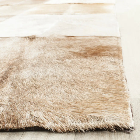 Safavieh Studio Leather 8'-0" x 10'-0" Rug in Beige / Brown