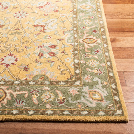 Safavieh Antiquity 5'-0" x 8'-0" Rug in Gold