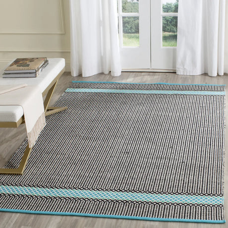 Safavieh Montauk 5'-0" x 7'-0" Rug in Turquoise / Multi