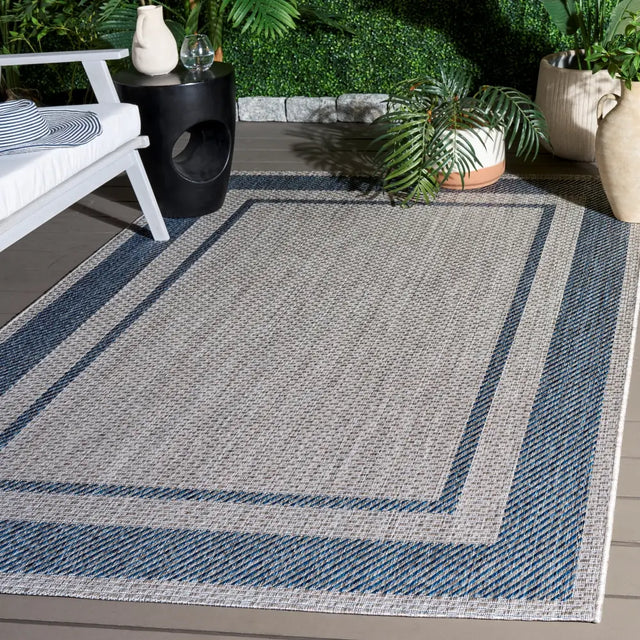 Safavieh Courtyard 5'-3" x 7'-7" Rug in Grey / Navy
