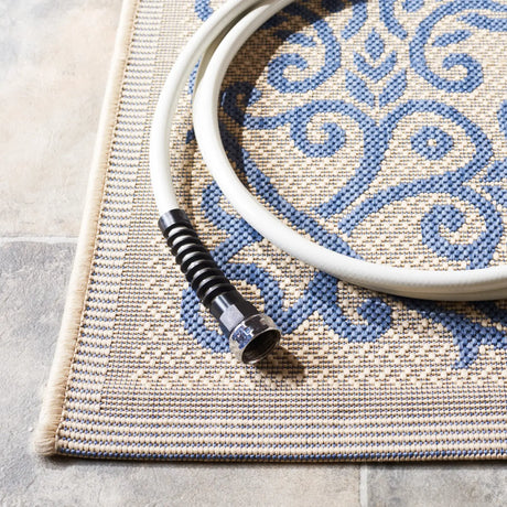 Safavieh Courtyard 5'-3" x 7'-7" Rug in Natural / Blue