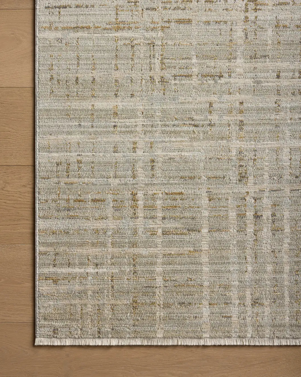 Loloi Wade Wae-03 Mist/Gold Rug - corner on wood
